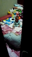 Peeking baby laughing