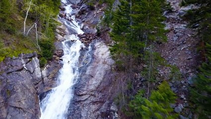 Drone soars over waterfall in Utah