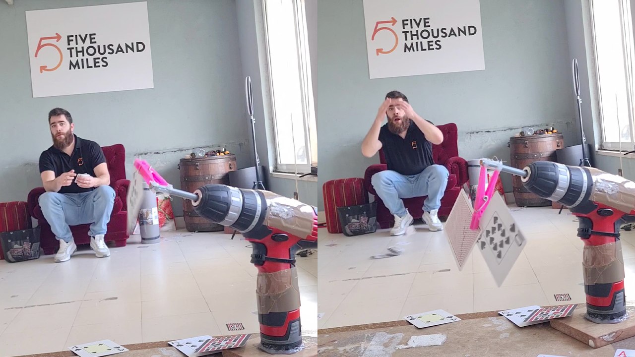 'Throwing two cards (in a row) into a verticallyspinning clothespin