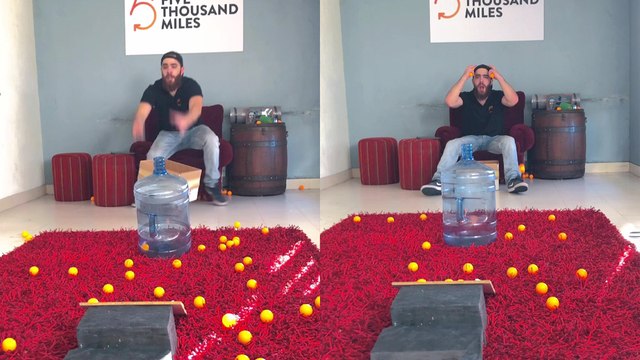 'Trickshot artist shows how to spit a ping pong ball into a water jug'