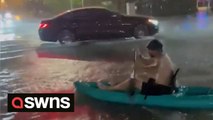 Kayaking through the flooded streets of Miami after a massive rain storm