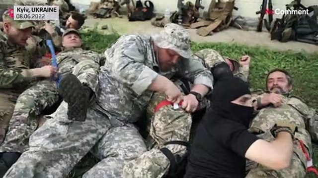 Volunteers of the new Ukrainian army train to defend their country