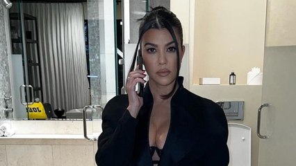 Kourtney Kardashian Goes Secretary-Chic in a Sheer Bra and Mini Blazer Dress