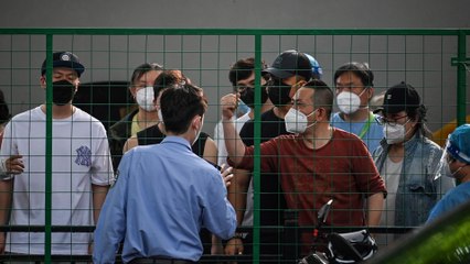 Shanghai residents confront officials after swift return of lockdown