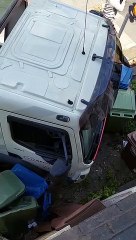 A tipper truck has smashed into a bus