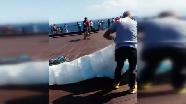 Uçuş yapmaya hazırlanan yamaç paraşütçüsü rüzgarın azizliğine uğradı
