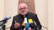 Top German bishop offers to quit over church's abuse scandals