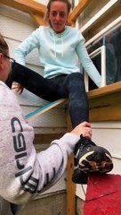 Girl Fits Inside Small Cat Door Cut into a Window