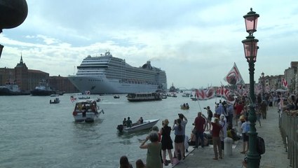 First cruise ship to arrive in Venice since early 2020 greeted by protesters