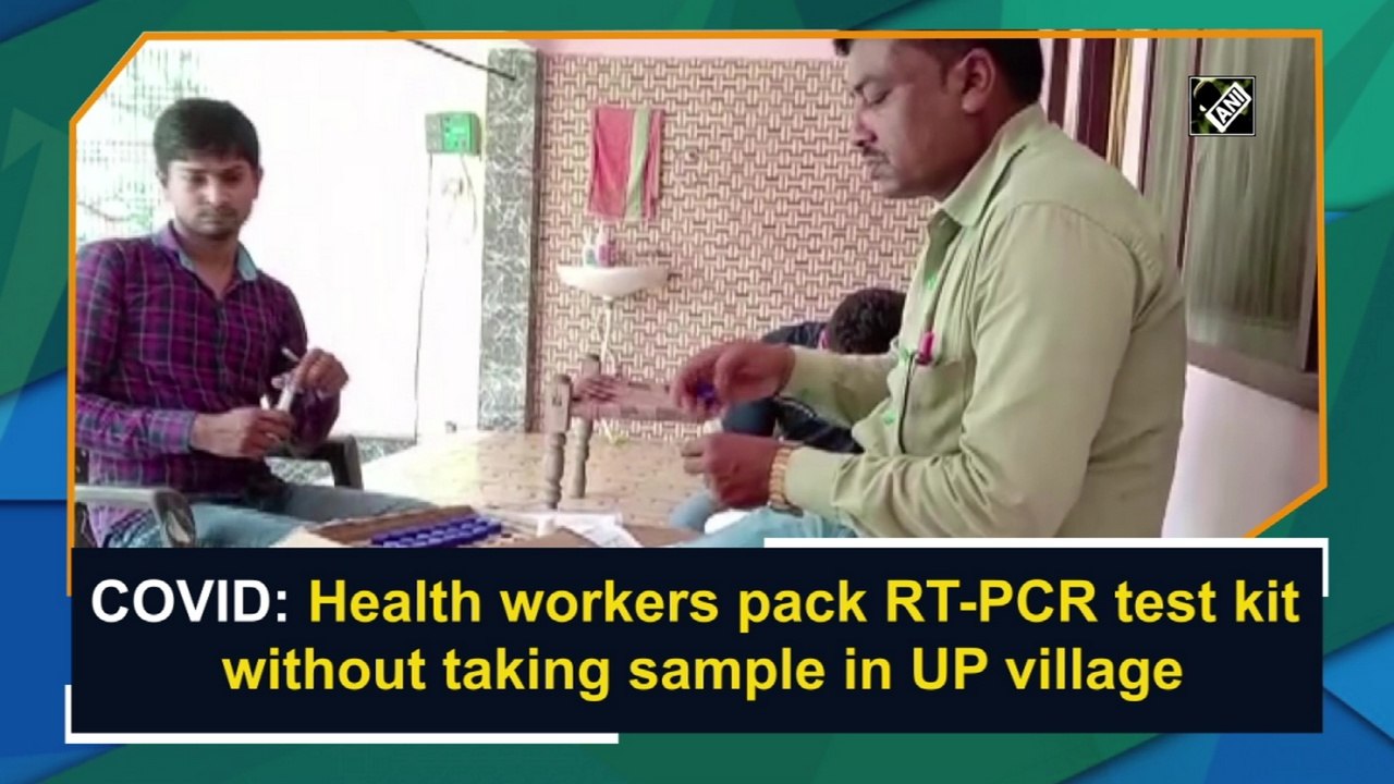 Covid-19: Health workers pack RT-PCR test kit w...