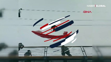 Paraşütçüler teleferik telesiyej hattında asılı kaldı