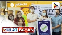 3 business establishment sa Navotas, ginawaran ng safety seal; Ilang nagwalk-in para magpabakuna sa navotas fishport, inabutan ng cutoff
