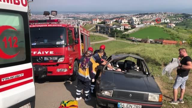 Yokuş aşağı freni boşalan araç kontrolden çıkarak takla attı