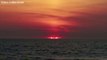 Solar eclipse turns the sky red off coast of US state of New Jersey