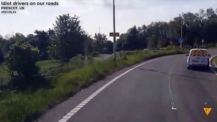Careless pickup driver runs red light. 2021.05.24 — PRESCOT, UK