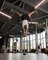 Man Performs Balancing Tricks on Barbell