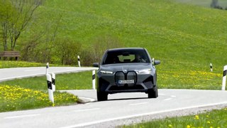The first-ever BMW iX in Grey Driving Video