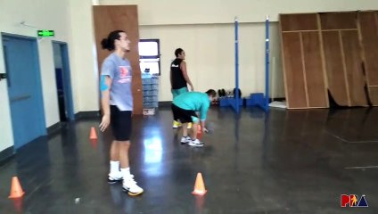 Phoenix works on passing with heavy ball in practice