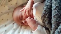 Few days old baby waking up,  so sweet