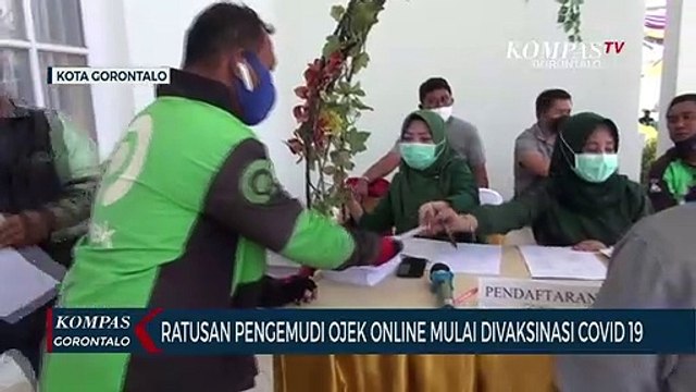 Ratusan Pengemudi Ojek Daring Divaksinasi Covid-19