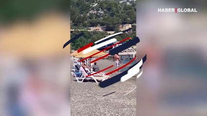 Halk plajına inen helikopterle ilgili gizem sürüyor