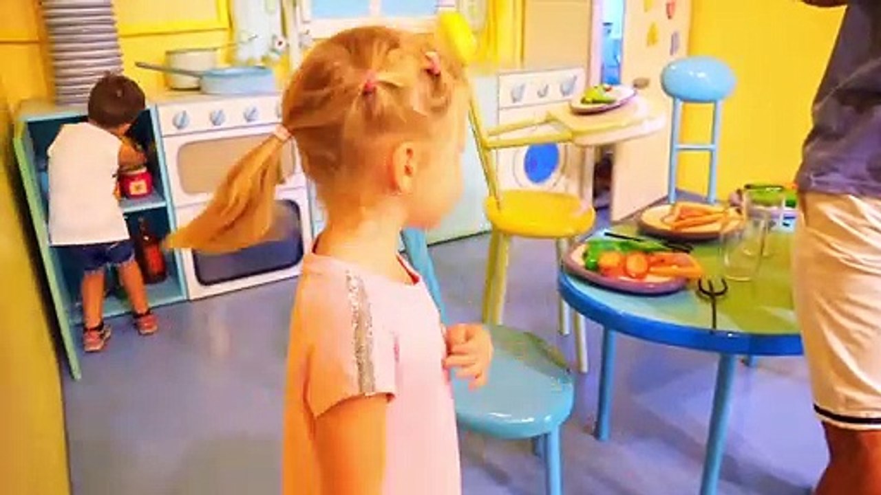 Nastya Playing In The Playhouse Of Peppa Toy In The Amusement Park