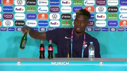 Pogba removes Heineken bottle at Euro news conference