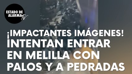 ¡IMPACTANTES IMÁGENES! Más de 150 ilegales intentan entrar en Melilla con palos y a pedradas