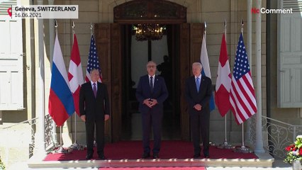 Biden and Putin shake hands at summit venue