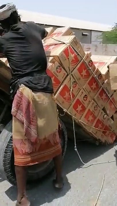 Overloaded donkey cart