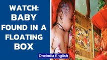 Uttar Pradesh: Baby girl found floating in a wooden box in Ganga | Watch | Oneindia News