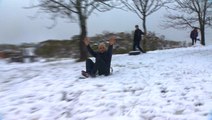 Residents enjoy first snowfall in 14 years