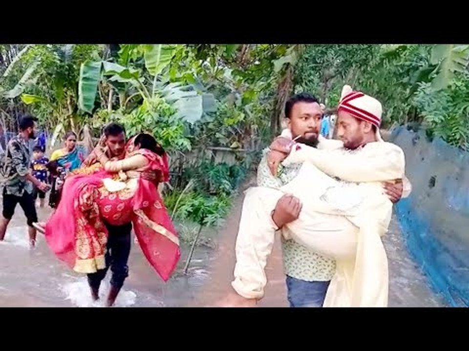 জোয়ারে ভেসে গেছে বিস্তীর্ণ এলাকা, এর মধ্যেও বরিশালে চলে বিয়ের আয়োজন | Jagonews24.com