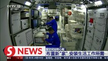 Chinese astronauts board space station module and settle in