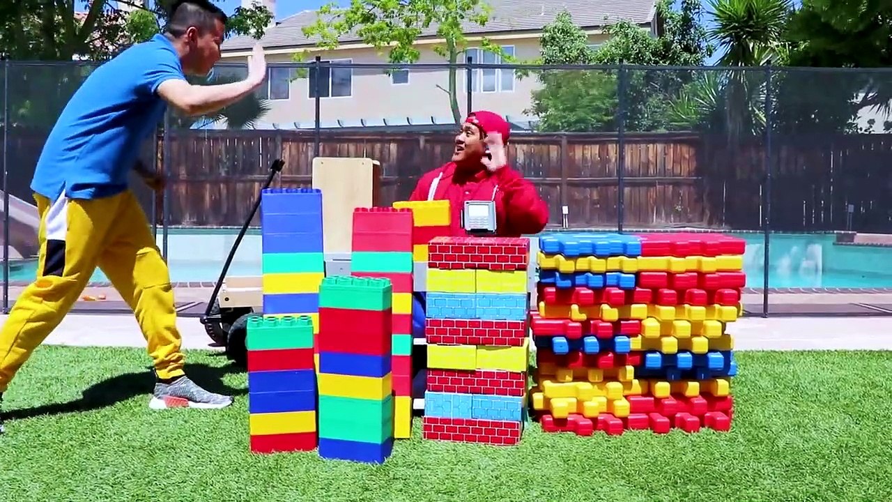 Wendy Pretend Playing With Colored Toy Blocks