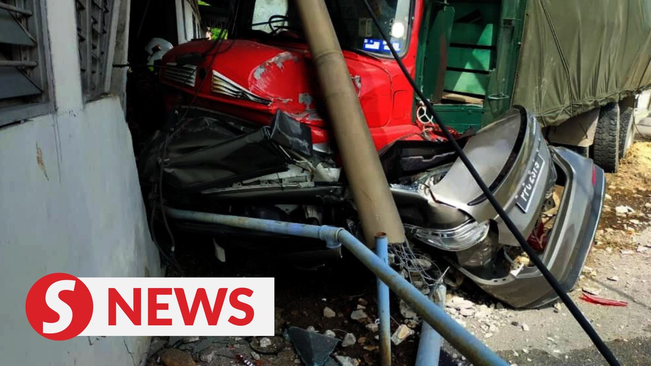 Woman dies after being struck by lorry, driver flees