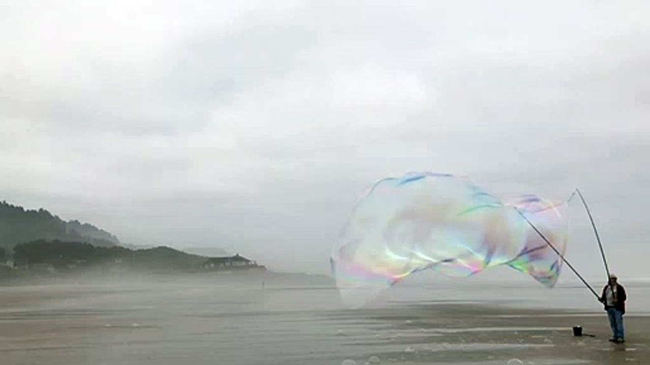 Incredible Giant Bubble Stretches Along Beach