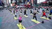 More than 3,000 people practice yoga at Times Square in New York City on Yoga Day