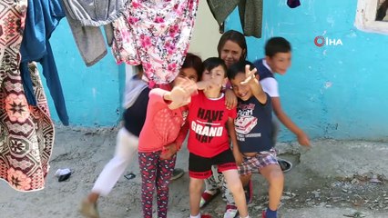 Roman mahallelerini tek tek gezip oy istiyor