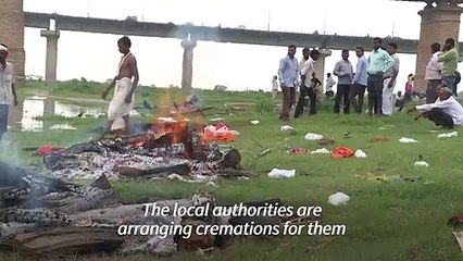 India's Covid graves exposed as Ganges river floods