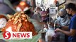 Retrenched couple get back on their feet with nasi lemak stall
