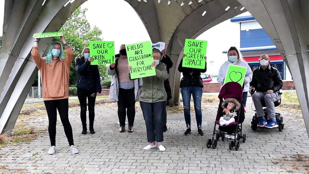 Protesters gather outside Burnley College to protest against expansion plans