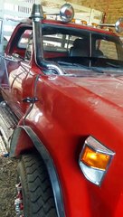 8 year old boy driving a dodge 600 truck