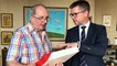 Michael Clarke receives a signed Czech Republic shirt from the Czech Consul General