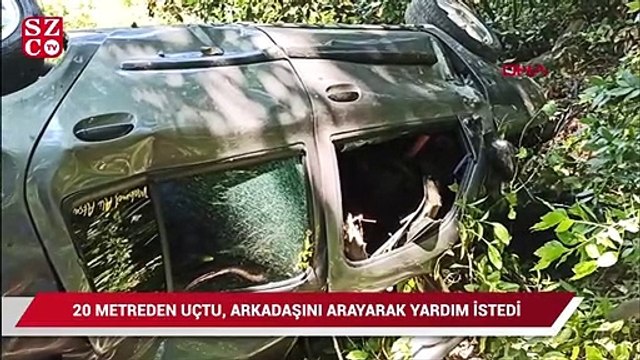 20 metreden uçan otomobilin sürücüsü, arkadaşını arayıp yardım istedi