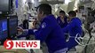 Chinese astronauts enjoy hearty meals amid tasks in space station