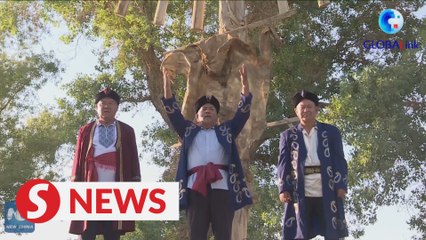 Fisherman in Xinjiang embraces modern life while keeping traditions