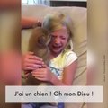 Une petite fille reçoit un chien pour son anniversaire