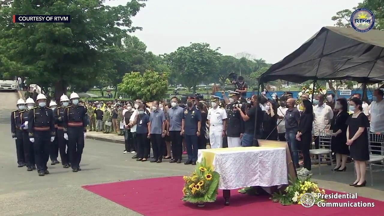 Aquino given full military honors at burial