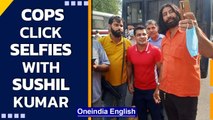 Delhi cops click selfies with murder suspect & Olympic medallist Sushil Kumar | Oneindia News